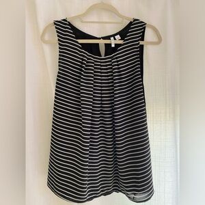 Women’s black and white striped top. Like new condition. Size L.